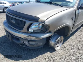 2001 Ford F-150 XL z VIN 2FTRX18L61CA78784, wystawiony jako IAAI lot #42228289 z przebiegiem 208 507 mil mil oraz . Historia ofert i sprzedaży dostępna na DreamBid. Obrazek 6.