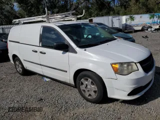 2013 Ram Cargo Van Tradesman with VIN 2C4JRGAGXDR812805, listed as a Copart auction lot 84934214 with 184,209 mi miles and Salvage Title. Bid and sale history available at carsss.com. Image 4.
