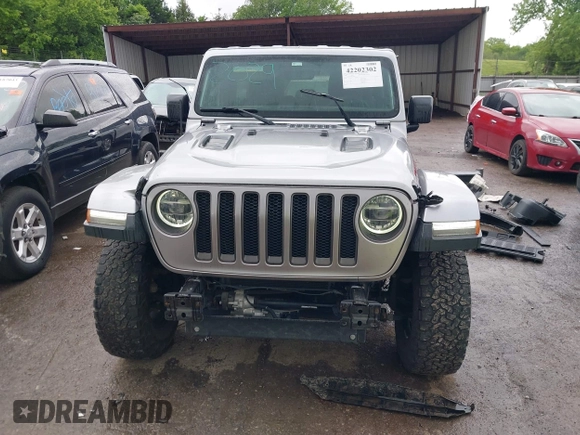 2018 Jeep Wrangler Unlimited Rubicon with VIN 1C4HJXFG4JW174603, listed as a IAAI auction lot 42202302 with 120,229 mi miles and . Bid and sale history available at DreamBid. Image 13.