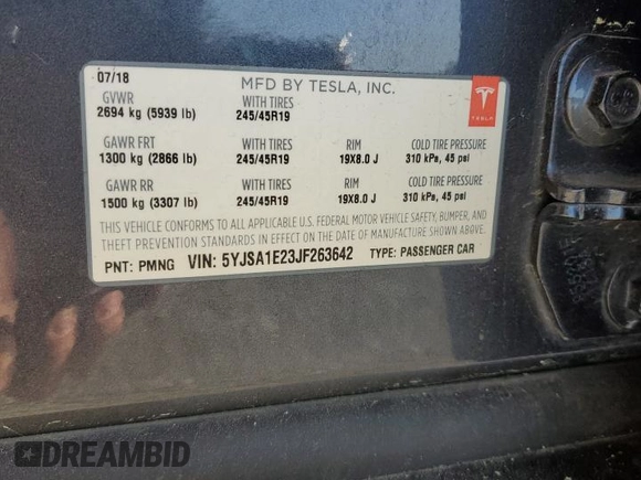 2018 Tesla Model S 75D z VIN 5YJSA1E23JF263642, wystawiony jako Copart lot #50647665 z przebiegiem 71 416 mil mil oraz Szkoda całkowita • Salvage title. Historia ofert i sprzedaży dostępna na DreamBid. Obrazek 13.