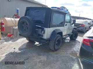 2005 Jeep Wrangler Unlimited with VIN 1J4FA44S25P340852, listed as a IAAI auction lot 41441671 with 139,302 mi miles. Bid and sale history available at carsss.com. Image 4.