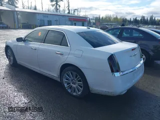 2011 Chrysler 300 with VIN 2C3CA6CT9BH581181, listed as a IAAI auction lot 41981733 with 156,460 mi miles. Bid and sale history available at carsss.com. Image 3.
