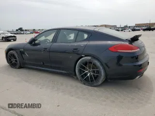 2016 Porsche Panamera 4 z VIN WP0AA2A75GL001291, wystawiony jako Copart lot #57095895 z przebiegiem Nie podano mil oraz Czysty tytuł • Clean title. Historia ofert i sprzedaży dostępna na DreamBid. Obrazek 2.
