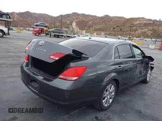 2010 Toyota Avalon XL with VIN 4T1BK3DB2AU368105, listed as a IAAI auction lot 40966346 with 147,122 mi miles and . Bid and sale history available at DreamBid. Image 4.