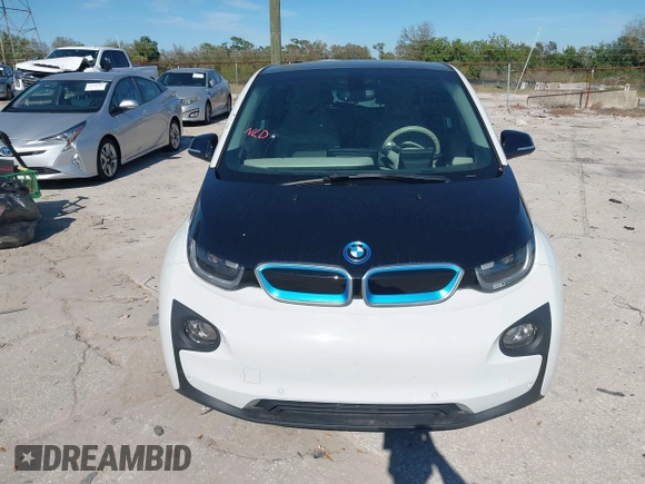2017 BMW i3 z VIN WBY1Z8C55HV550906, wystawiony jako IAAI lot #41705056 z przebiegiem 79 566 mil mil oraz . Historia ofert i sprzedaży dostępna na DreamBid. Obrazek 12.