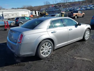 2014 Chrysler 300 C with VIN 2C3CCAKG2EH273274, listed as a IAAI auction lot 41638665 with 164,888 mi miles and . Bid and sale history available at carsss.com. Image 4.