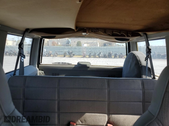 1996 Jeep Cherokee Sport with VIN 1J4FJ68S3TL257912, listed as a Copart auction lot 77109634 with 53,841 mi miles and Clean Title. Bid and sale history available at carsss.com. Image 10.