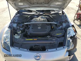 2004 Nissan 350Z Touring z VIN JN1AZ34E94T062960, wystawiony jako Copart lot #55822235 z przebiegiem 186 879 mil mil oraz Szkoda całkowita • Salvage title. Historia ofert i sprzedaży dostępna na DreamBid. Obrazek 11.