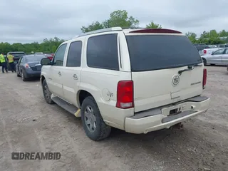 2004 Cadillac Escalade z VIN 1GYEK63N04R207168, wystawiony jako IAAI lot #42348203 z przebiegiem 251 847 mil mil oraz . Historia ofert i sprzedaży dostępna na DreamBid. Obrazek 3.