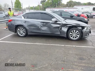 2016 Infiniti Q50 Premium z VIN JN1EV7AR1GM344827, wystawiony jako IAAI lot #41953405 z przebiegiem 123 952 mil mil oraz . Historia ofert i sprzedaży dostępna na DreamBid. Obrazek 13.