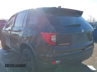 2021 Honda Passport Sport with VIN 5FNYF8H25MB030432, listed as a IAAI auction lot 41184469 with 44,315 mi miles and . Bid and sale history available at DreamBid. Image 3.