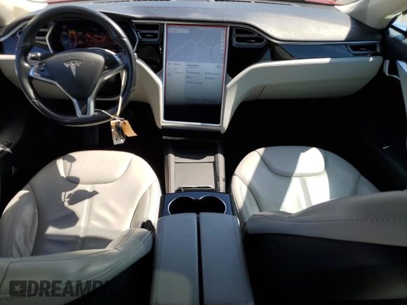 2014 Tesla Model S 60 with VIN 5YJSA1S12EFP65799, listed as a Copart auction lot 50895235 with 132,669 mi miles and Salvage Title. Bid and sale history available at DreamBid. Image 8.