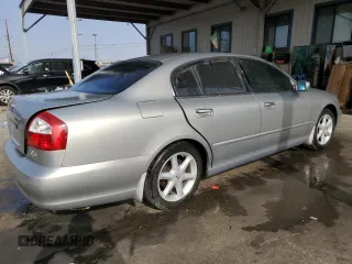 2003 Infiniti Q45 z VIN JNKBF01A03M101890, wystawiony jako Copart lot #86930994 z przebiegiem 158 134 mil mil oraz Szkody całkowita. Historia ofert i sprzedaży dostępna na DreamBid. Obrazek 3.