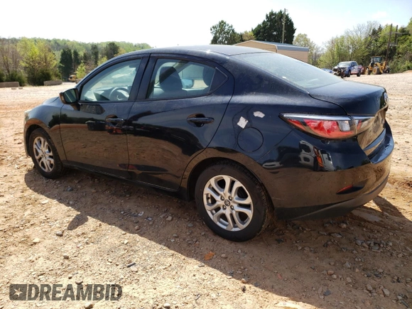 2018 Toyota Yaris with VIN 3MYDLBYV0JY326720, listed as a Copart auction lot 52027505 with 105,127 mi miles and Salvage Title. Bid and sale history available at DreamBid. Image 2.