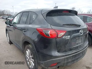 2015 Mazda CX-5 Grand Touring with VIN JM3KE4DY0F0479229, listed as a IAAI auction lot 41838381 with 139,843 mi miles. Bid and sale history available at carsss.com. Image 3.
