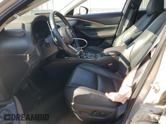 2023 Mazda CX-30 S Premium with VIN 3MVDMBDM6PM525178, listed as a Copart auction lot 54330005 with 21,670 mi miles and Salvage title. Bid and sale history available at DreamBid. Image 7.