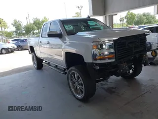 2019 Chevrolet Silverado 1500 LT with VIN 2GCVKPEC4K1139373, listed as a IAAI auction lot 42198276 with 76,844 mi miles and . Bid and sale history available at DreamBid. Image 14.
