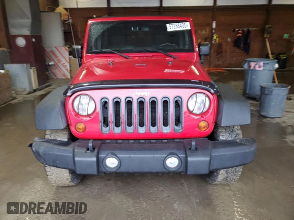 2012 Jeep Wrangler Unlimited Sport z VIN 1C4HJWDG2CL117124, wystawiony jako Copart lot #57288435 z przebiegiem 134 860 mil mil oraz Czysty tytuł • Clean title. Historia ofert i sprzedaży dostępna na DreamBid. Obrazek 5.