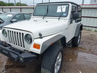 2003 Jeep Wrangler Sport with VIN 1J4FA49S43P362339, listed as a IAAI auction lot 41452901 with 208,128 mi miles and . Bid and sale history available at DreamBid. Image 18.
