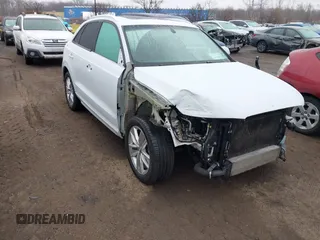 2018 Audi Q3 Premium with VIN WA1ECCFS5JR014331, listed as a IAAI auction lot 41801575 with 134,966 mi miles. Bid and sale history available at carsss.com. Image 1.