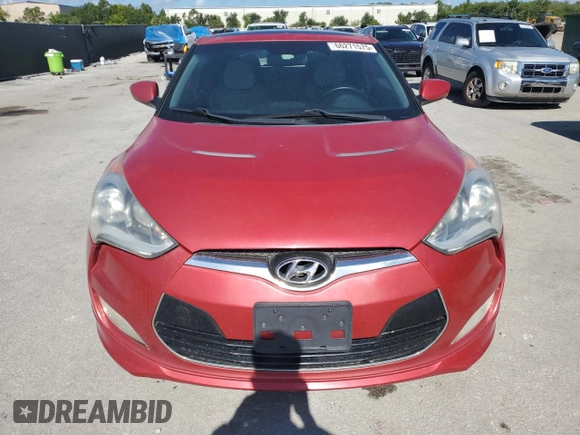 2014 Hyundai Veloster with VIN KMHTC6AD1EU198737, listed as a Copart auction lot 66271575 with 119,895 mi miles and Salvage title. Bid and sale history available at DreamBid. Image 5.