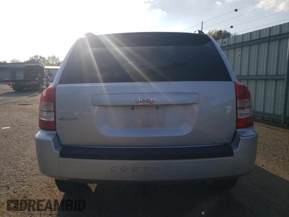 2010 Jeep Compass Sport with VIN 1J4NF4FB4AD513051, listed as a Copart auction lot 79667494 with 0 mi miles and Salvage Title. Bid and sale history available at carsss.com. Image 6.