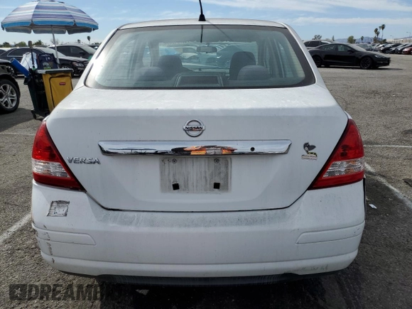 2008 Nissan Versa 1.8 S with VIN 3N1BC11E58L371074, listed as a Copart auction lot 46701965 with 49,467 mi miles and Salvage Title. Bid and sale history available at carsss.com. Image 6.