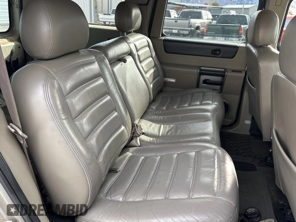 2003 Hummer H2 with VIN 5GRGN23UX3H124517, listed as a Copart auction lot 41650395 with 999,999 mi miles and Clean Title. Bid and sale history available at carsss.com. Image 6.