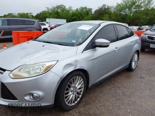 2012 Ford Focus SEL with VIN 1FAHP3H22CL102110, listed as a IAAI auction lot 41963966 with 151,538 mi miles. Bid and sale history available at carsss.com. Image 6.
