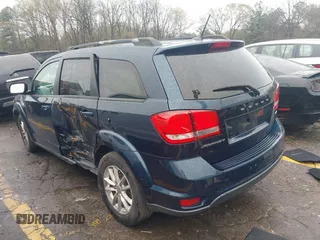 2014 Dodge Journey SXT with VIN 3C4PDCBB4ET245932, listed as a IAAI auction lot 41857444 with 228,827 mi miles. Bid and sale history available at carsss.com. Image 3.