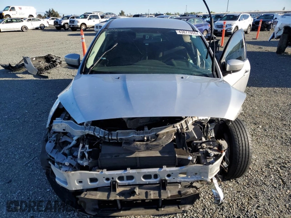 2018 Ford Focus SE with VIN 1FADP3F23JL226448, listed as a Copart auction lot 43877055 with 77,253 mi miles and Salvage Title. Bid and sale history available at carsss.com. Image 5.