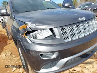 2015 Jeep Grand Cherokee Summit with VIN 1C4RJFJG8FC679185, listed as a IAAI auction lot 41653531 with 158,186 mi miles and . Bid and sale history available at DreamBid. Image 12.