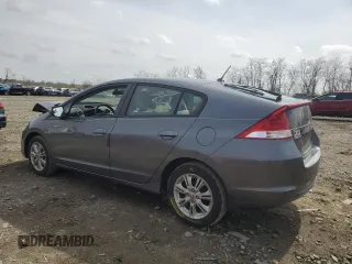 2011 Honda Insight EX with VIN JHMZE2H75BS008221, listed as a Copart auction lot 51910115 with 82,670 mi miles and Salvage Title. Bid and sale history available at DreamBid. Image 2.
