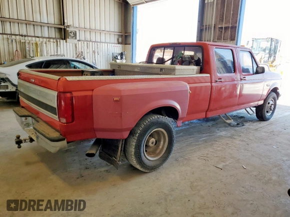 1995 Ford F-350 with VIN 1FTJW35F5SEA46141, listed as a Copart auction lot 63977585 with 386,819 mi miles and Salvage title. Bid and sale history available at DreamBid. Image 3.