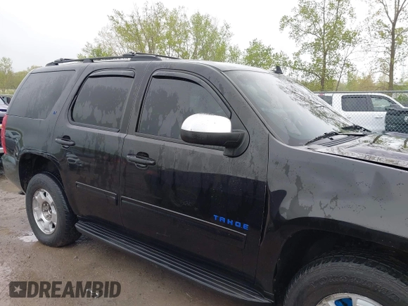 2009 Chevrolet Tahoe 2LT z VIN 1GNFK23009R296956, wystawiony jako IAAI lot #42143854 z przebiegiem 162 156 mil mil oraz . Historia ofert i sprzedaży dostępna na DreamBid. Obrazek 13.