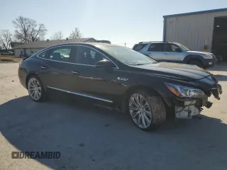 2017 Buick LaCrosse Essence with VIN 1G4ZP5SS1HU164890, listed as a Copart auction lot 47861915 with 154,731 mi miles and Salvage Title. Bid and sale history available at DreamBid. Image 4.