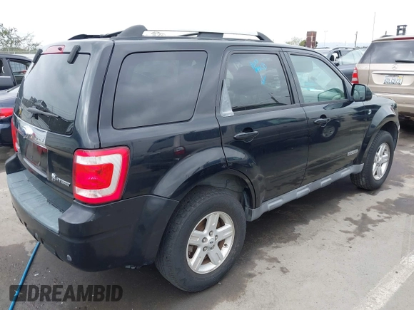 2008 Ford Escape Hybrid with VIN 1FMCU49H38KE50450, listed as a IAAI auction lot 42565336 with Not provided miles and . Bid and sale history available at DreamBid. Image 4.