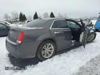 2015 Chrysler 300 C with VIN 2C3CCAET3FH802449, listed as a Copart auction lot 44647285 with 123,358 mi miles and Salvage Title. Bid and sale history available at DreamBid. Image 3.