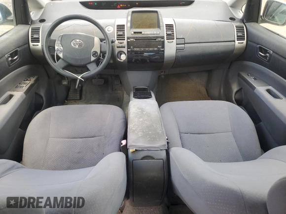 2006 Toyota Prius with VIN JTDKB22U167521985, listed as a Copart auction lot 54974335 with 128,541 mi miles and Clean Title. Bid and sale history available at carsss.com. Image 8.