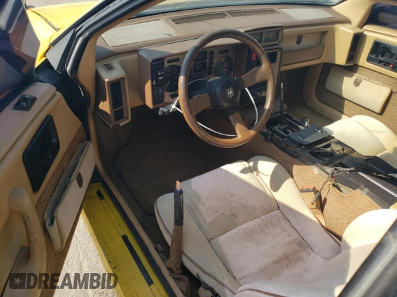 1986 Pontiac Fiero z VIN 1G2PG9796GP256622, wystawiony jako Copart lot #69203894 z przebiegiem 38 964 mil mil oraz Szkody całkowita. Historia ofert i sprzedaży dostępna na DreamBid. Obrazek 8.