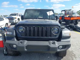 2024 Jeep Wrangler Sport S with VIN 1C4PJXDG7RW325735, listed as a IAAI auction lot 41309348 with 3,577 mi miles and . Bid and sale history available at DreamBid. Image 13.