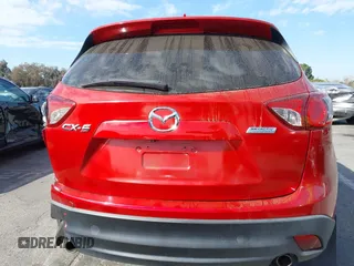2016 Mazda CX-5 Sport with VIN JM3KE2BY4G0701442, listed as a IAAI auction lot 41682335 with 125,624 mi miles. Bid and sale history available at carsss.com. Image 17.