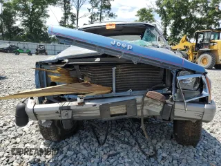 1991 Jeep Cherokee z VIN 1J4FJ58S0ML519252, wystawiony jako Copart lot #55458005 z przebiegiem 152 129 mil mil oraz Szkoda całkowita • Salvage title. Historia ofert i sprzedaży dostępna na DreamBid. Obrazek 5.