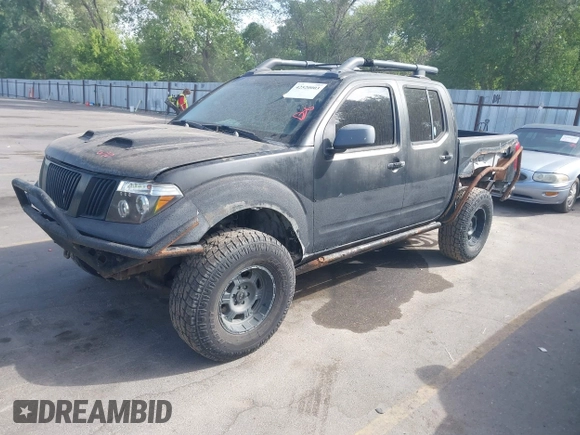 2006 Nissan Frontier LE with VIN 1N6AD07W86C462328, listed as a IAAI auction lot 42520003 with 186,231 mi miles and . Bid and sale history available at DreamBid. Image 2.