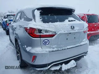 2018 Lexus RX 350L Premium z VIN JTJDZKCA9J2008933, wystawiony jako IAAI lot #41600527 z przebiegiem 93 423 mil mil oraz . Historia ofert i sprzedaży dostępna na DreamBid. Obrazek 3.