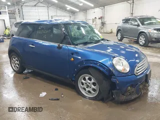 2012 MINI Hardtop z VIN WMWSU3C55CT184924, wystawiony jako IAAI lot #42276347 z przebiegiem 92 468 mil mil oraz . Historia ofert i sprzedaży dostępna na DreamBid. Obrazek 1.