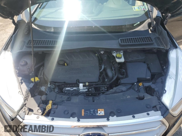 2018 Ford Escape SE z VIN 1FMCU9GD3JUA78244, wystawiony jako Copart lot #59508955 z przebiegiem 108 273 mil mil oraz Szkoda całkowita • Salvage title. Historia ofert i sprzedaży dostępna na DreamBid. Obrazek 12.