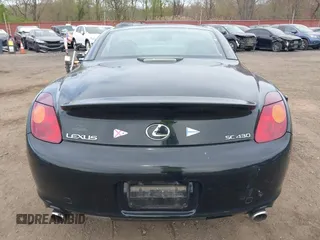 2002 Lexus SC 430 z VIN JTHFN48Y920032217, wystawiony jako IAAI lot #42091287 z przebiegiem 62 093 mil mil oraz . Historia ofert i sprzedaży dostępna na DreamBid. Obrazek 16.