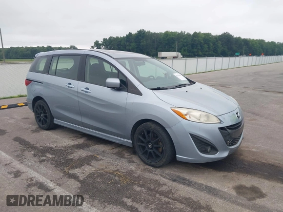 2012 Mazda 5 Touring with VIN JM1CW2CL7C0115096, listed as a IAAI auction lot 42524956 with 173,155 mi miles and . Bid and sale history available at DreamBid. Image 1.