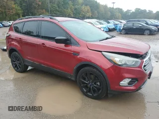 2018 Ford Escape SE z VIN 1FMCU9GD4JUA49819, wystawiony jako Copart lot #73023734 z przebiegiem 96 228 mil mil oraz Szkody całkowita. Historia ofert i sprzedaży dostępna na DreamBid. Obrazek 4.